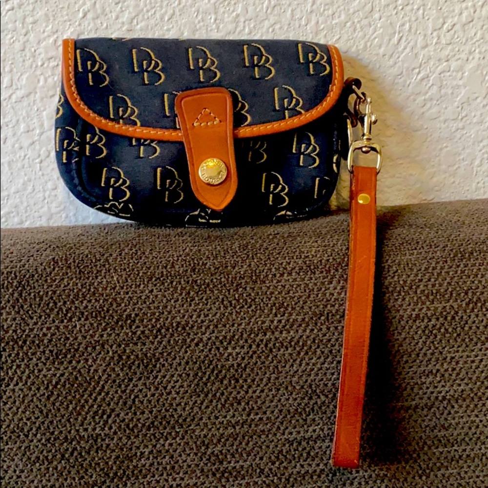 Dooney & Bourke wristlet. Black canvas w/ leather